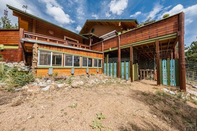 361 Crystal Peak Rd, Florissant, CO 80814 - rear view of house featuring an outbuilding and an exterior structure