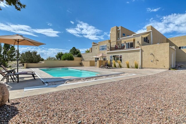 view of pool with a patio area and a fenced in pool