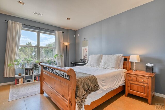 bedroom featuring baseboards, visible vents, and recessed lighting