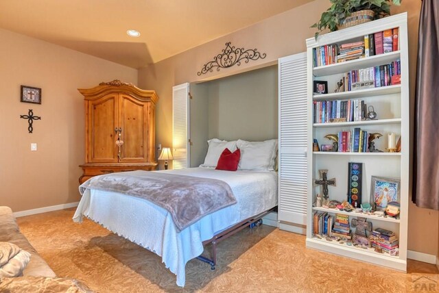 bedroom featuring baseboards