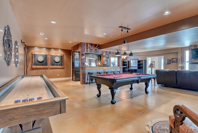 rec room with a healthy amount of sunlight, recessed lighting, billiards, and finished concrete floors