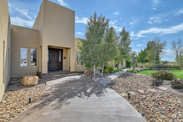 view of front of property featuring stucco siding