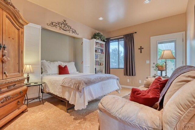 bedroom with recessed lighting and baseboards