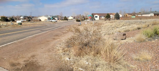 view of road featuring a residential view