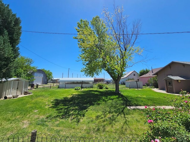 103 S Goff St, Eads, CO 81036 - view of yard featuring a storage shed and an outdoor structure