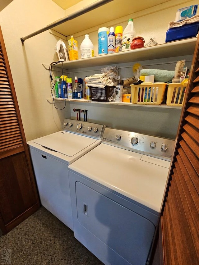 103 S Goff St, Eads, CO 81036 - clothes washing area featuring washer and clothes dryer and dark colored carpet