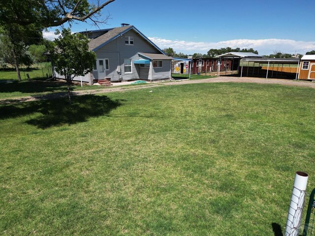 view of yard with entry steps