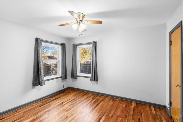 2701 Franklin Ave, Pueblo, CO 81003 - empty room featuring wood finished floors and ceiling fan