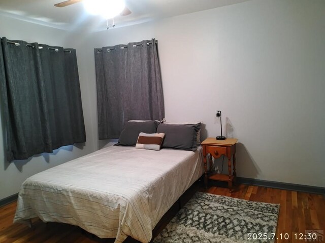 2701 Franklin Ave, Pueblo, CO 81003 - bedroom featuring wood finished floors and a ceiling fan