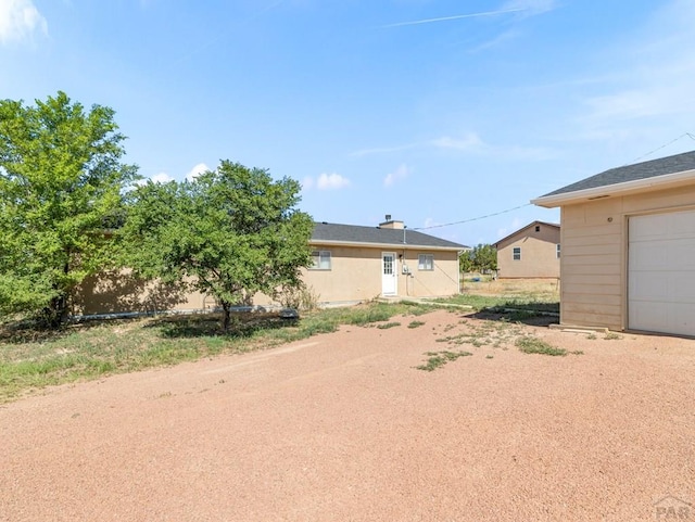 106 Grant St, Penrose, CO 81240 - view of yard with a garage