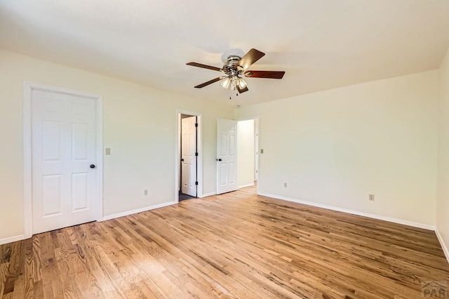 4366 Witches Hollow Ln, Colorado Springs, CO 80911 - unfurnished bedroom featuring light wood-type flooring and a ceiling fan