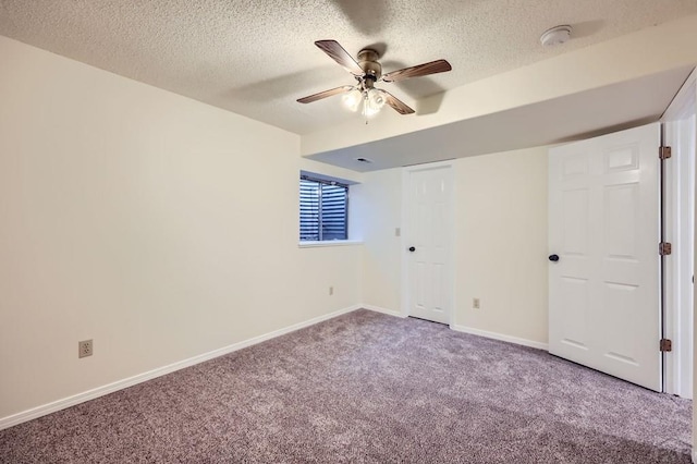 4366 Witches Hollow Ln, Colorado Springs, CO 80911 - unfurnished bedroom featuring carpet floors, a textured ceiling, and ceiling fan