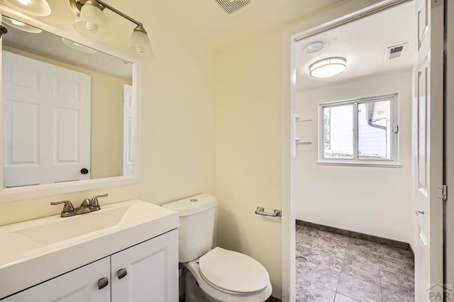 4366 Witches Hollow Ln, Colorado Springs, CO 80911 - bathroom featuring vanity and toilet