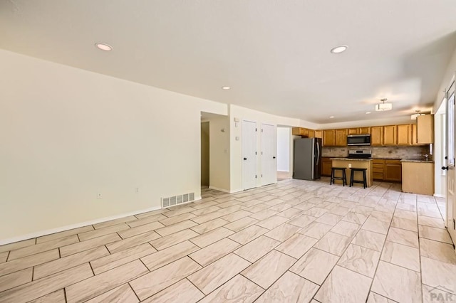 4366 Witches Hollow Ln, Colorado Springs, CO 80911 - unfurnished living room featuring recessed lighting