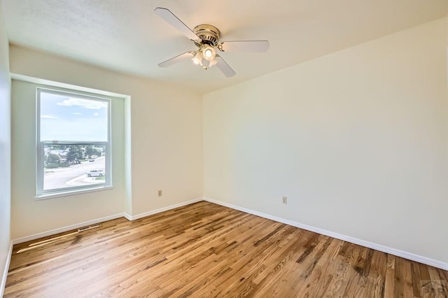 4366 Witches Hollow Ln, Colorado Springs, CO 80911 - unfurnished room featuring wood finished floors and a ceiling fan