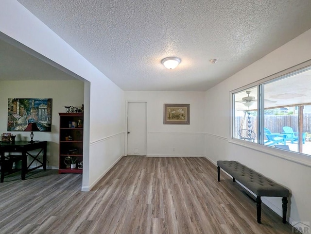 29 Mountview Dr, La Junta, CO 81050 - unfurnished room with a textured ceiling, wood finished floors, and baseboards