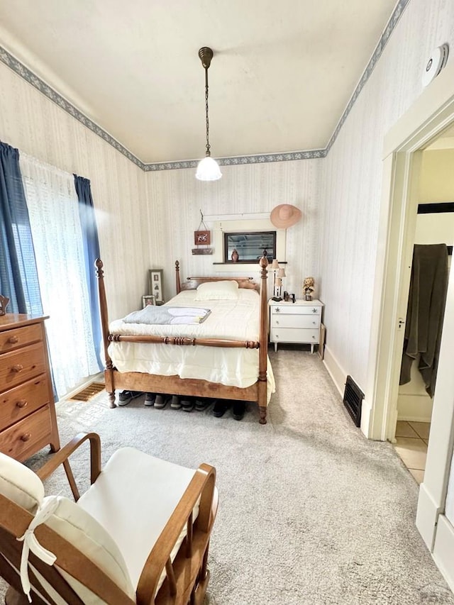 914 Santa Fe, La Junta, CO 81050 - bedroom featuring wallpapered walls and carpet flooring