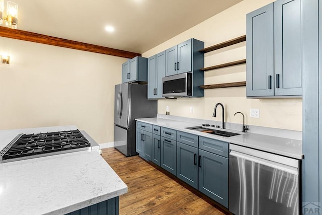 332 Yellow Bird Rd, Rye, CO 81069 - kitchen featuring stainless steel appliances, open shelves, light countertops, dark wood-type flooring, and recessed lighting