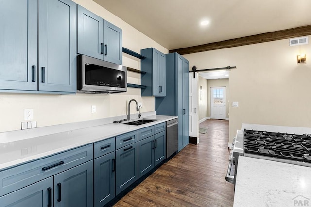 332 Yellow Bird Rd, Rye, CO 81069 - kitchen with appliances with stainless steel finishes, open shelves, blue cabinets, light countertops, and recessed lighting