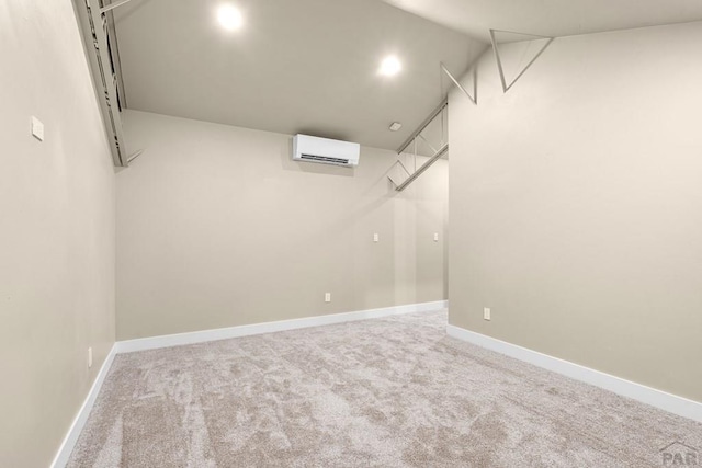 332 Yellow Bird Rd, Rye, CO 81069 - finished below grade area with an AC wall unit, carpet flooring, and recessed lighting