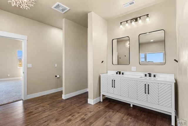 332 Yellow Bird Rd, Rye, CO 81069 - bathroom with double vanity and wood finished floors