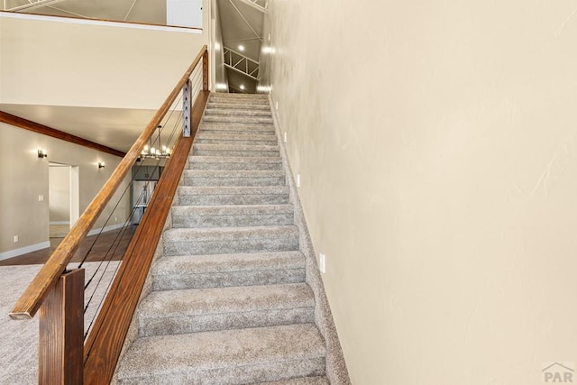 332 Yellow Bird Rd, Rye, CO 81069 - staircase with carpet flooring and crown molding