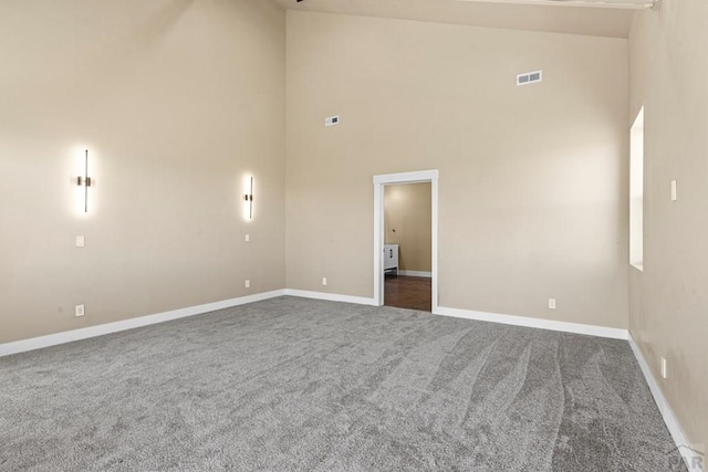 332 Yellow Bird Rd, Rye, CO 81069 - carpeted spare room with high vaulted ceiling