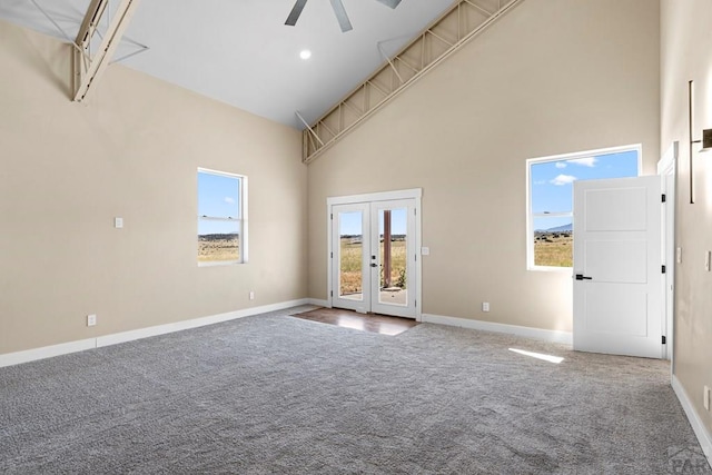 332 Yellow Bird Rd, Rye, CO 81069 - carpeted spare room featuring high vaulted ceiling, french doors, and ceiling fan