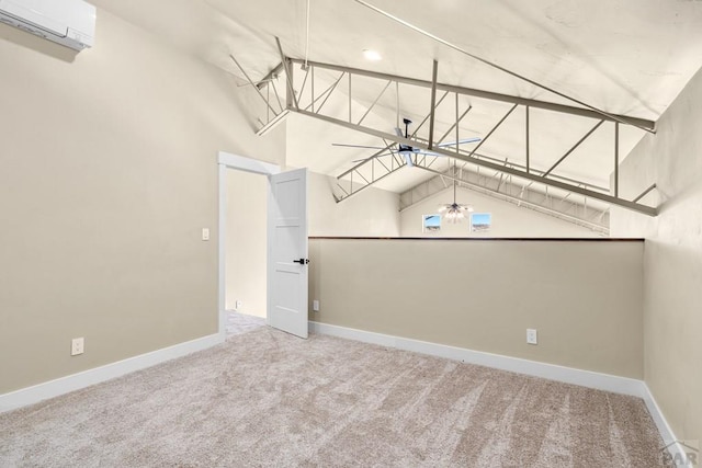 332 Yellow Bird Rd, Rye, CO 81069 - unfurnished room featuring an AC wall unit, carpet floors, and a high ceiling