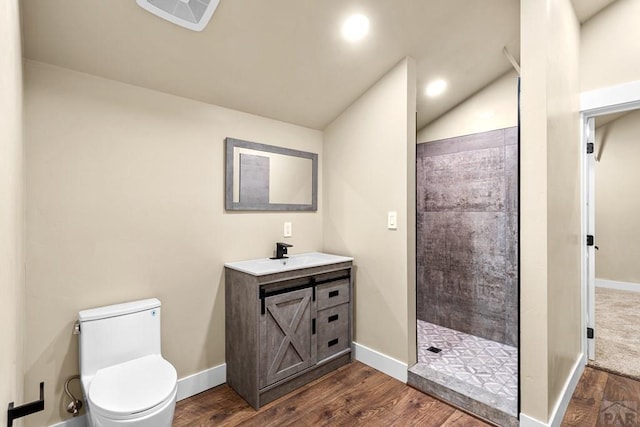 332 Yellow Bird Rd, Rye, CO 81069 - full bathroom with a tile shower, vanity, wood finished floors, and lofted ceiling