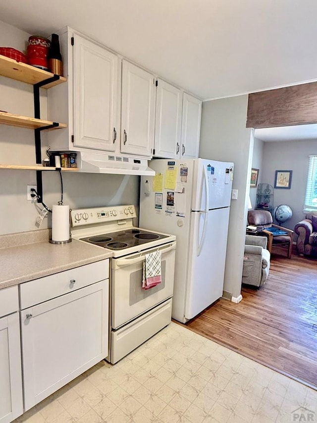 629 Gaylord Ave, Pueblo, CO 81004 - kitchen featuring white appliances, under cabinet range hood, white cabinetry, light countertops, and open shelves