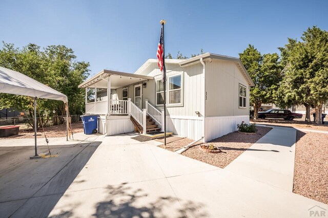 999 Fortino Blvd Unit 33, Pueblo, CO 81008 - manufactured / mobile home with a porch