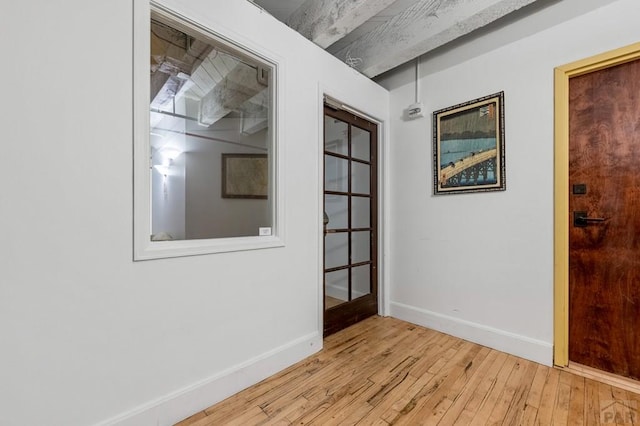 201 Lamkin St Unit 207, Pueblo, CO 81003 - unfurnished room featuring wood-type flooring and baseboards