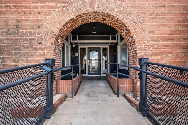 201 Lamkin St Unit 207, Pueblo, CO 81003 - view of exterior entry featuring brick siding