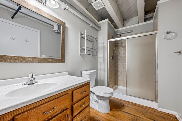 201 Lamkin St Unit 207, Pueblo, CO 81003 - full bathroom featuring vanity, a shower stall, and wood finished floors