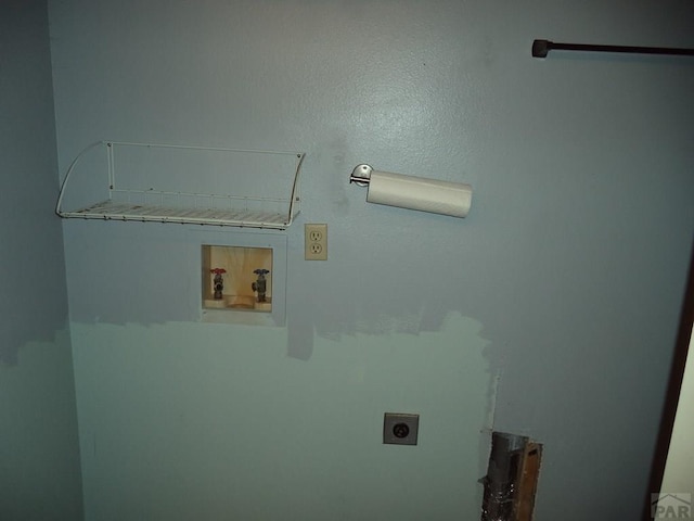 clothes washing area with hookup for an electric dryer and washer hookup