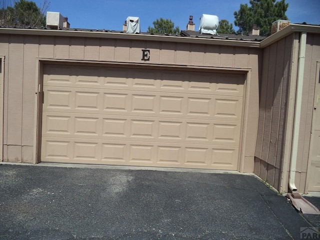garage featuring driveway