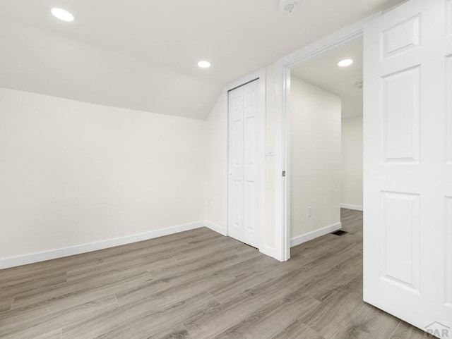 906 E 6th St, Pueblo, CO 81001 - bonus room featuring light wood finished floors, recessed lighting, and lofted ceiling