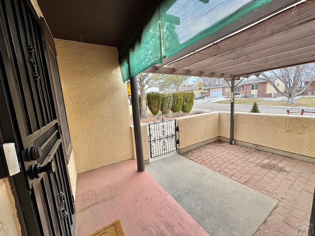 view of patio / terrace featuring a gate