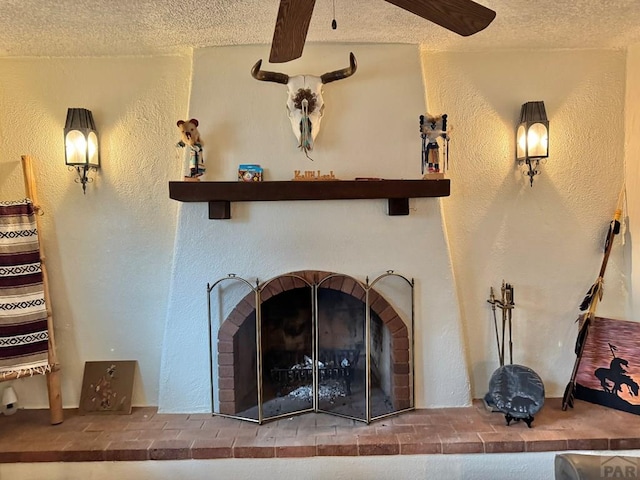 room details featuring a brick fireplace, beamed ceiling, a textured ceiling, and a textured wall