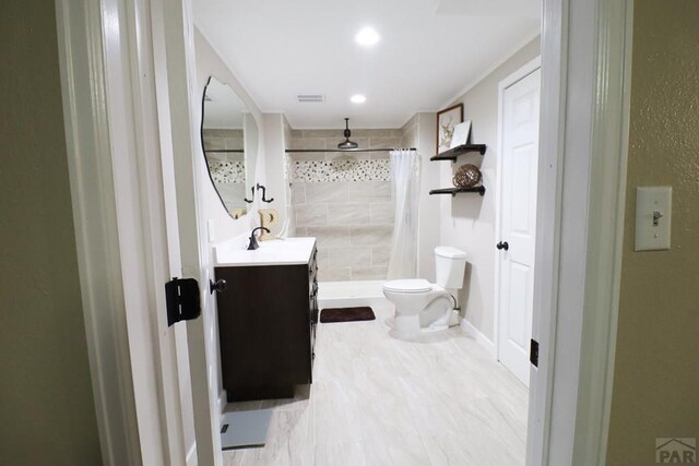 full bathroom featuring recessed lighting, visible vents, toilet, a shower stall, and vanity