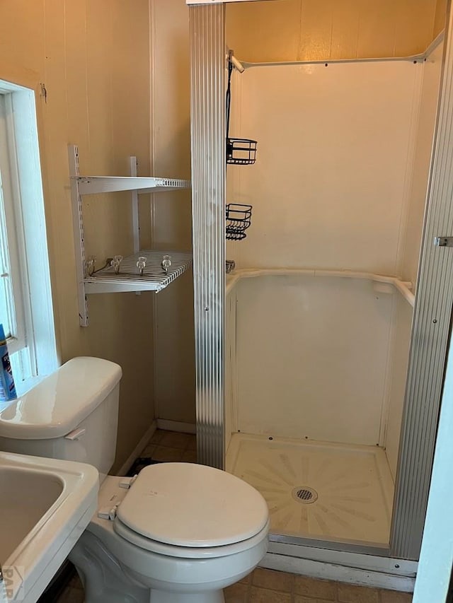 1410 E Orman Ave, Pueblo, CO 81004 - bathroom with a shower and tile patterned flooring
