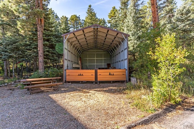 exterior space with a detached carport