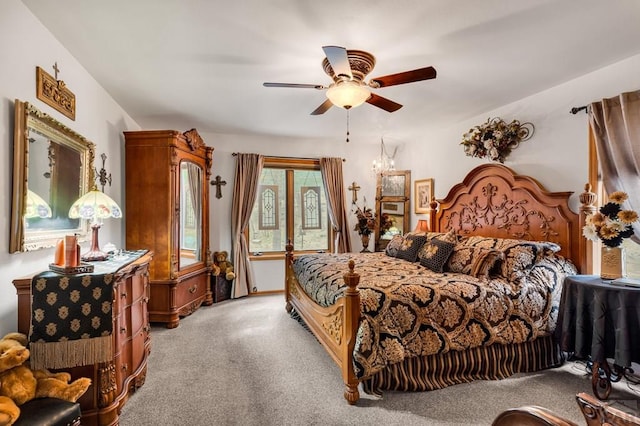 bedroom featuring a ceiling fan and light colored carpet