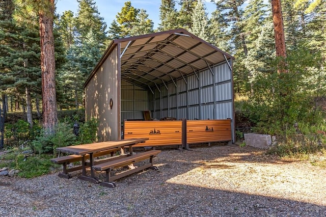 exterior space with a carport