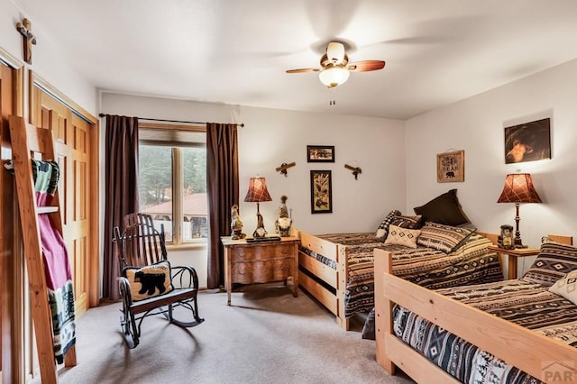 bedroom with light carpet and ceiling fan