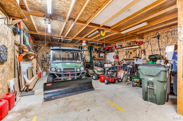 garage with a workshop area