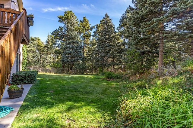 view of yard featuring fence