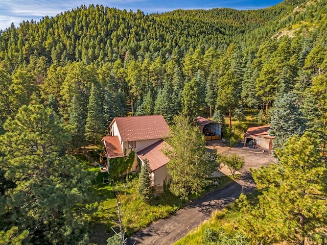 bird's eye view featuring a view of trees