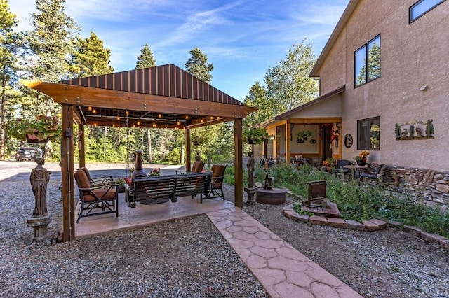 view of yard featuring outdoor lounge area, a patio, and a gazebo